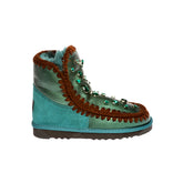 Classic Sheepskin Pebbles UGG boots Emeral Green Color made in Australia from premium Australian double-face sheepskin with rhinestone details and crochet seam border, stylish patent finish UGG boots for women, warm and cozy, water-resistant with durable sole for indoor and outdoor wear.